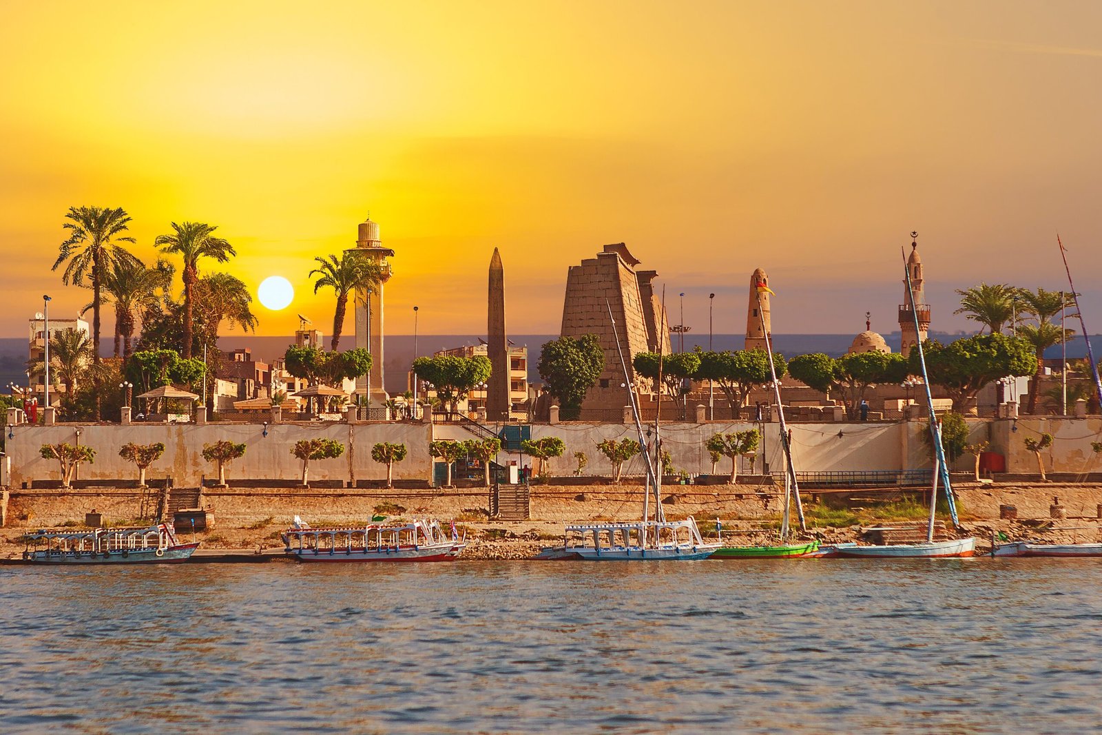 Antique Egyptian temple complex Luxor, Karnak. View of the ruins from the Nile River